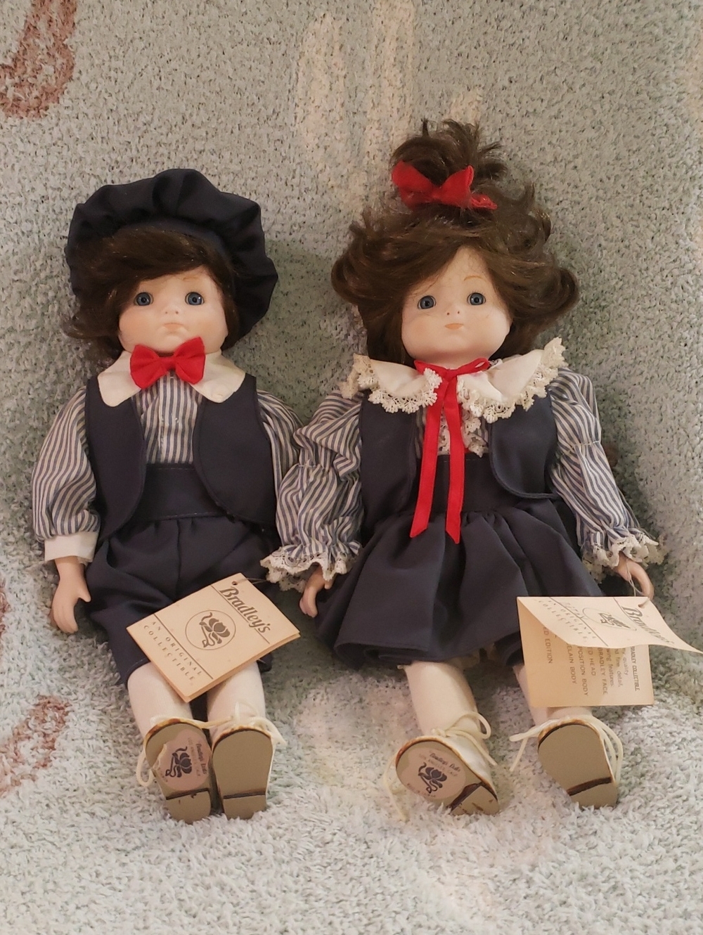 Pair of Porcelain Dolls in Navy with Red Accents
